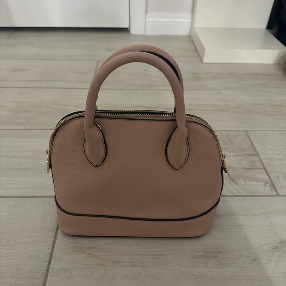basic light pink purse with gold details